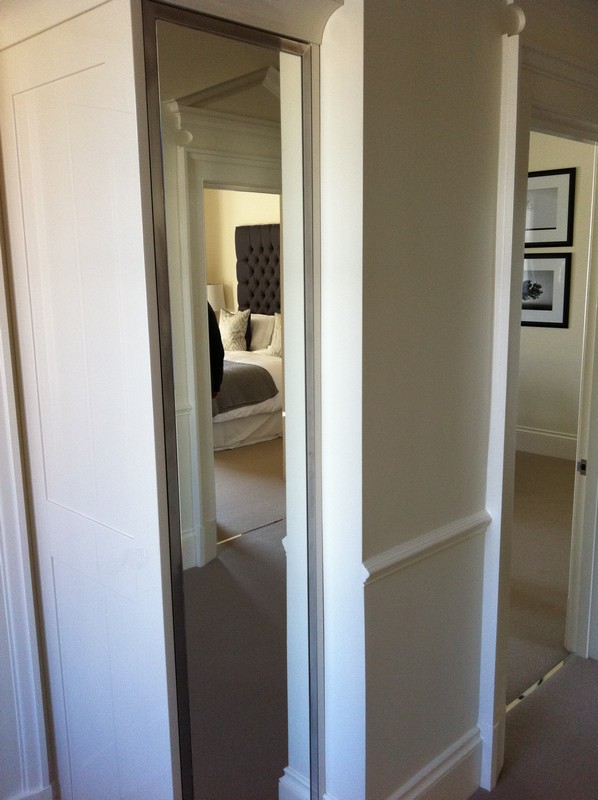 Full-length wardrobe mirror fitted in Highgate home