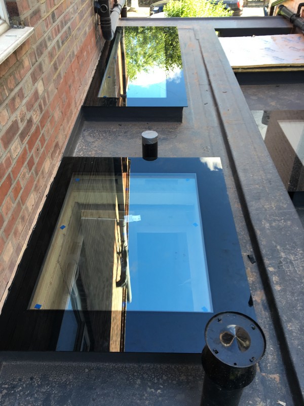 Multiple flat roof skylights on extension in Highgate